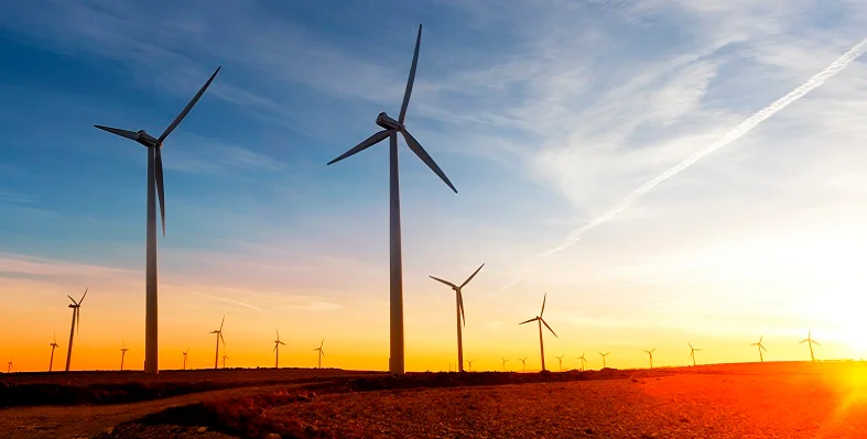 Infinity Power is a joint venture between Infinity and Masdar. (Image source: Infinity Power) Wind turbines at sunset.
