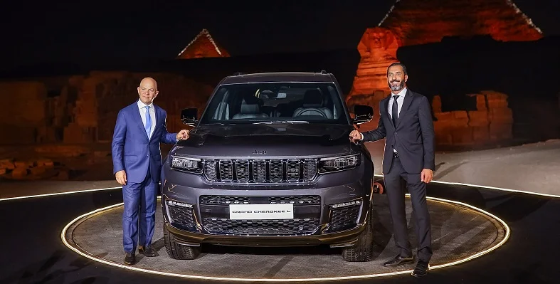 By localizing production, Stellantis is contributing to job creation, skill development, and technology transfer in Egypt. (Image source: Stellantis) Two senior stakeholders standing next to the new Jeep Grand Cherokee L at the unveiling.