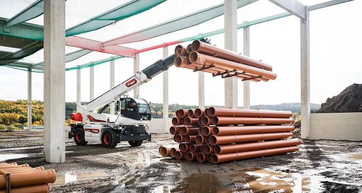Bobcat has included additional features to enhance the visibility around the machines. (Image source: Bobcat) A new rotary telehandler from Bobcat lifting pipes on a construction site.