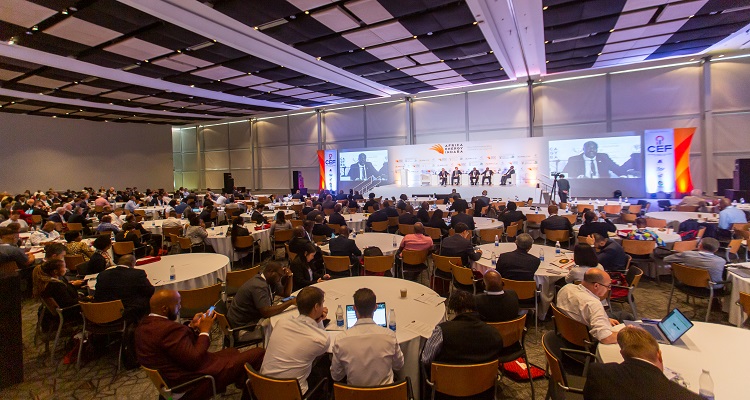 The conference hall of Africa Energy Indaba 2023 with participants speaking. 
